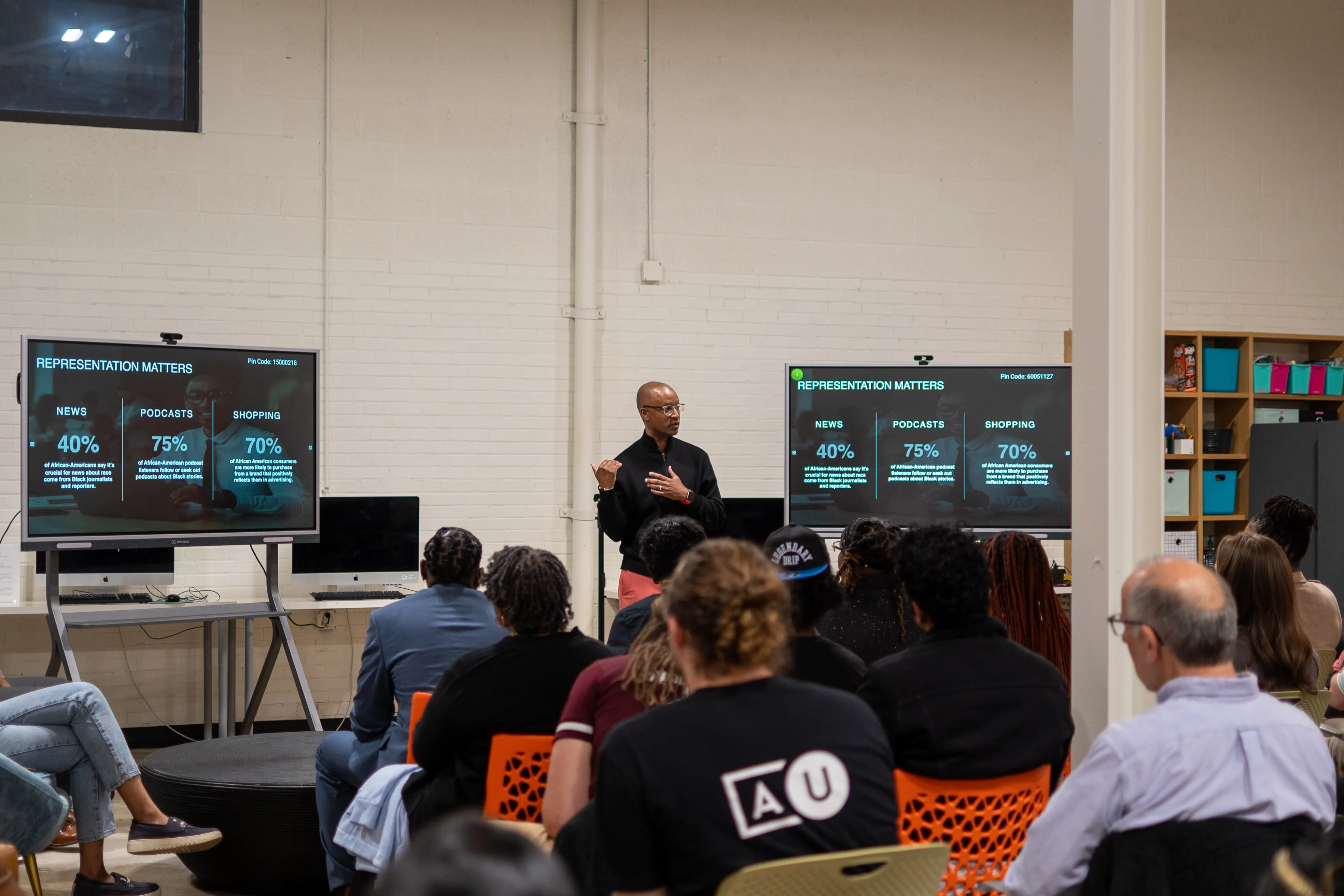 Cary giving a presentation on how "Representation Matters"